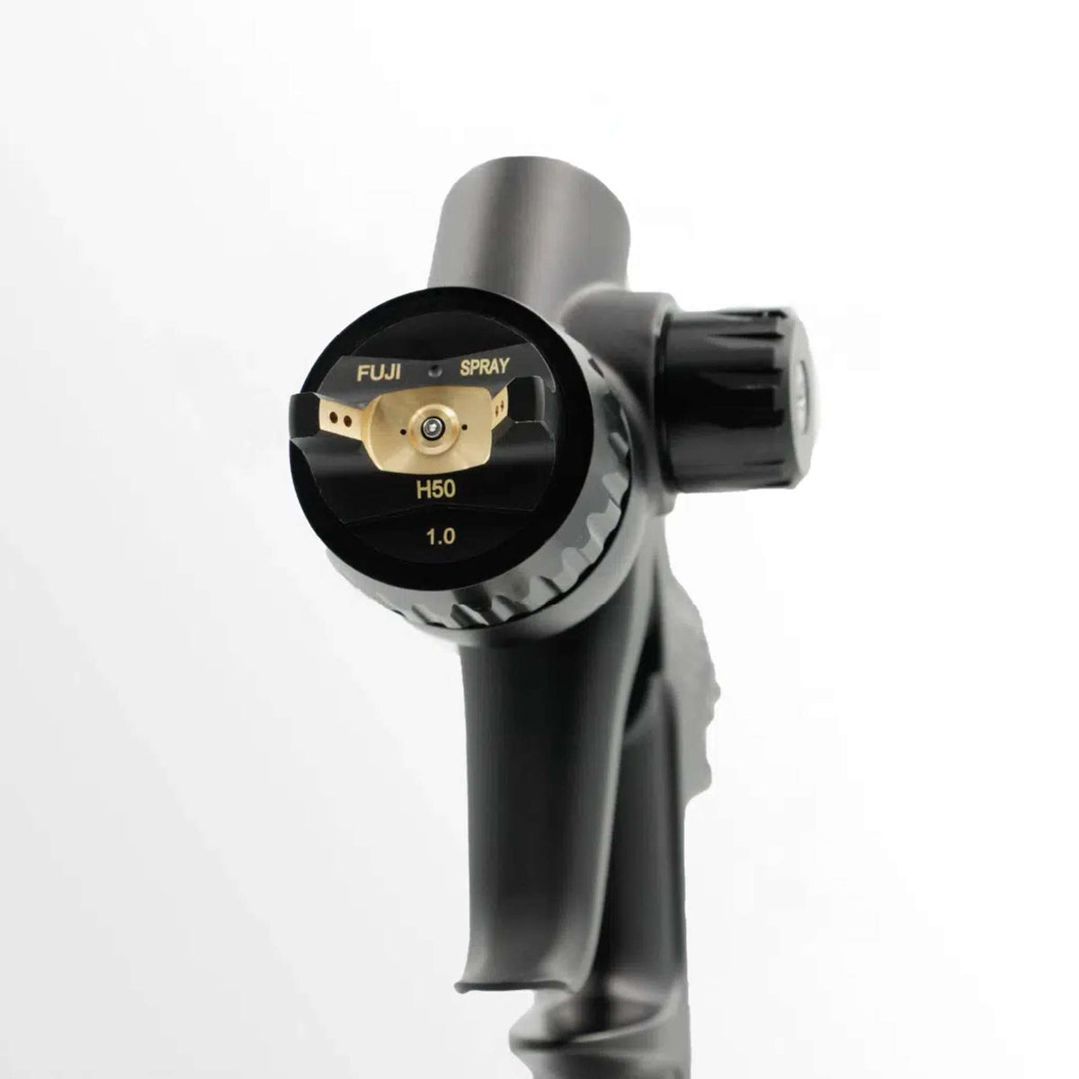 Close-up of the VALOR Mini H50 air cap face, marked FUJI SPRAY H50 1.0.