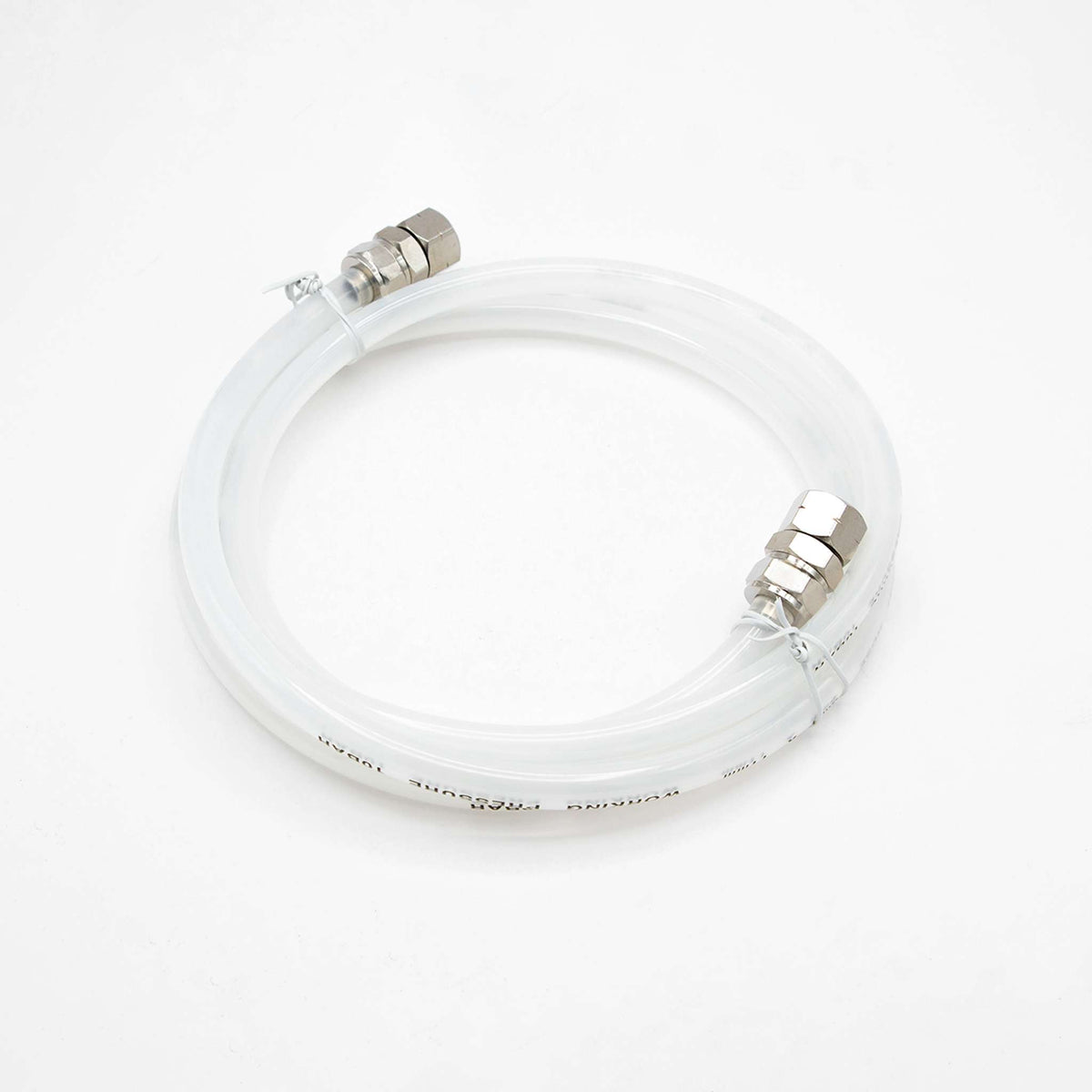 Coiled clear fluid hose for the 2 quart pressure pot, with a metal quick-connect fitting at each end.