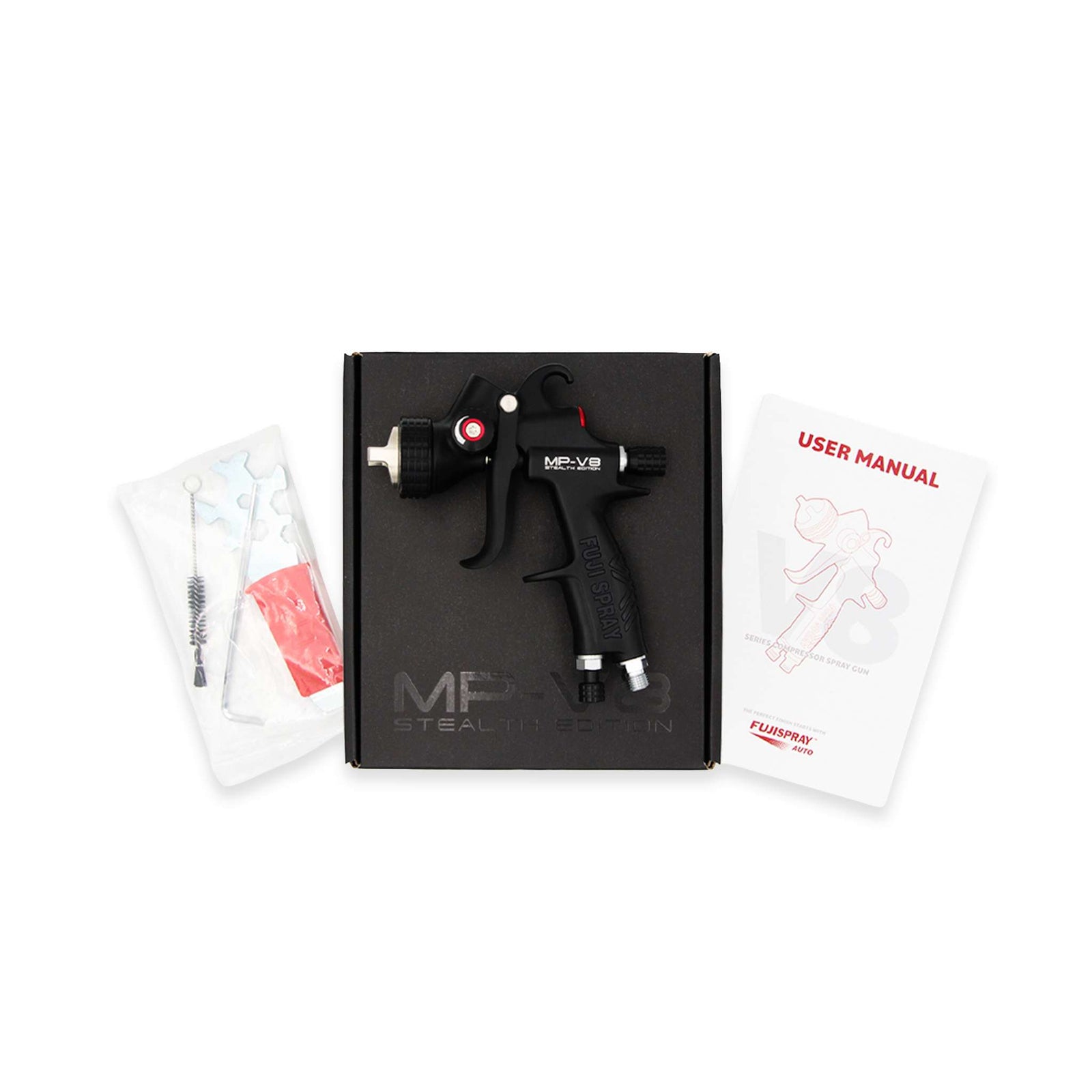 Fuji Spray MP-V8 STEALTH Edition retail box open, showing the gun, cleaning brush, spare parts and user manual.